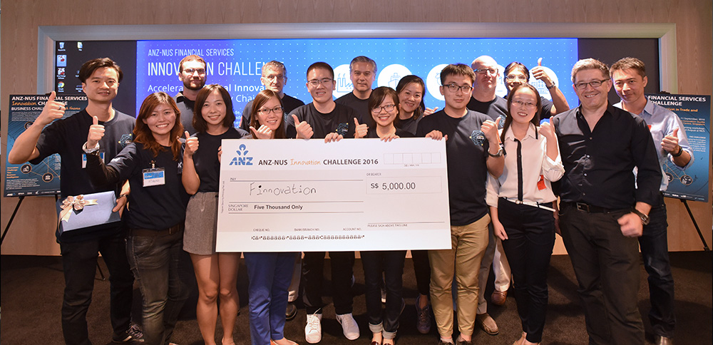 Event partners, including representatives from ANZ, IBM, NUS and Thomson Reuters pose with the winning students