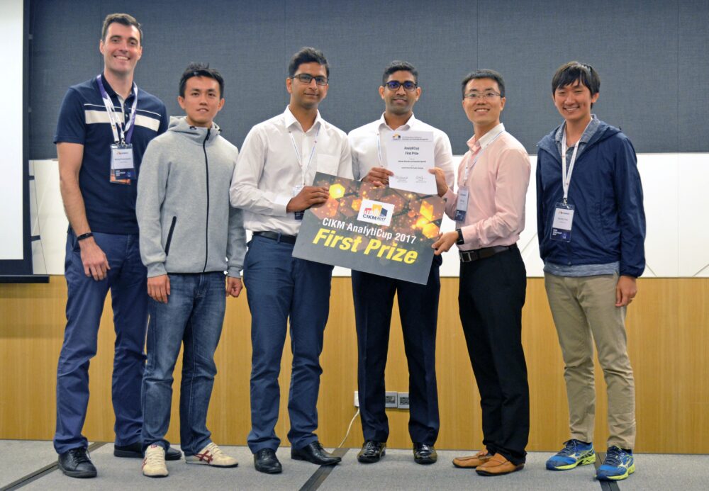 Samarth Agarwal (third from left) and Akshay Bhonde (fourth from left) receiving their prize