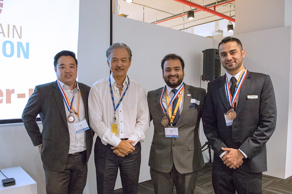 Team Suptech. From left: Joel Koh (MBA Year 1); Robert Yap (BBA 1976), Chairman of Supply Chain Asia, and Executive Chairman of YCH Group; Anjan Raina; and Rahul Duggal (both MBA Year 1)