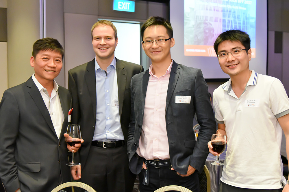 Alum Mr Benn Ng (left) sharing his wealth of experience and knowledge with our NUS MBA students