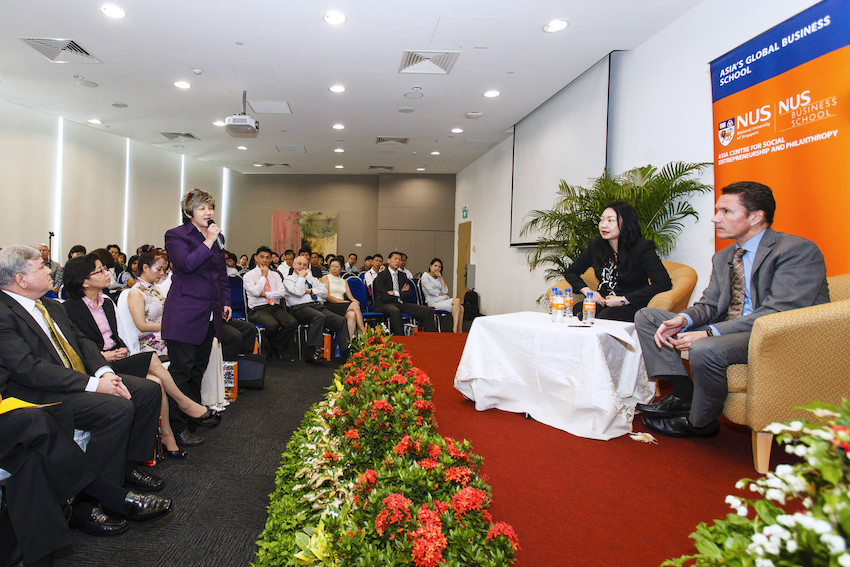 Audrey moderating a panel discussion at NUS Business School