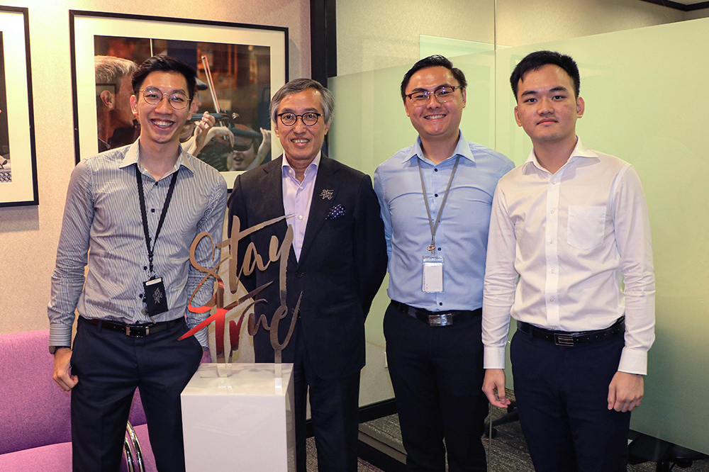Ching Wei Hong (second from left), Chief Operating Officer at OCBC Bank, and Bachelor of Business Administration (1983); with the NUS Business School Alumni (NUSBSA) team