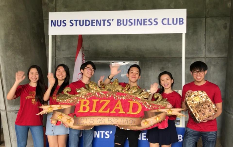 Clemon (third from right) explaining to prospective students about student group NUS Bizad Club at the recent NUS Open Day