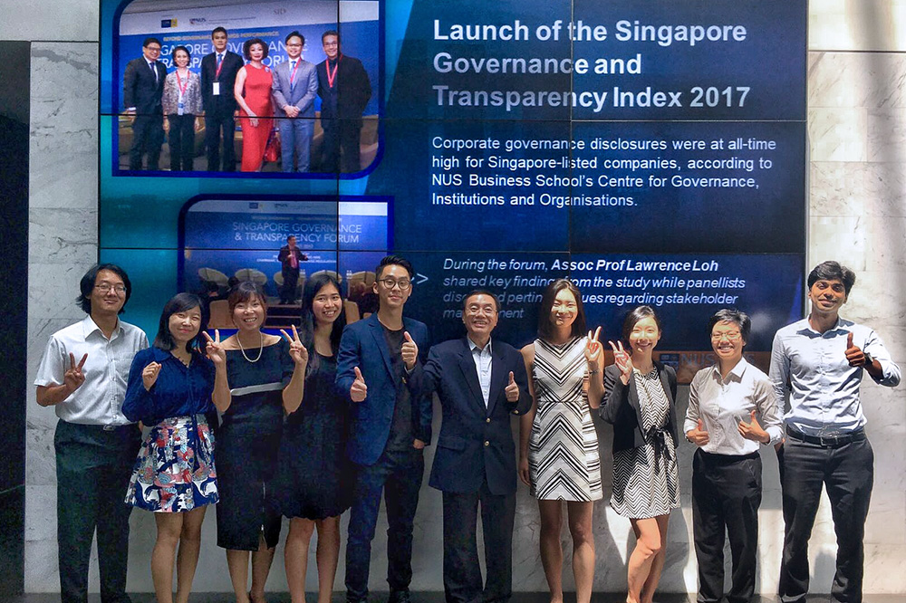 CGIO staff led by A/P Lawrence Loh (6th from left), celebrating the results of the Singapore Governance and Transparency Index 2017
