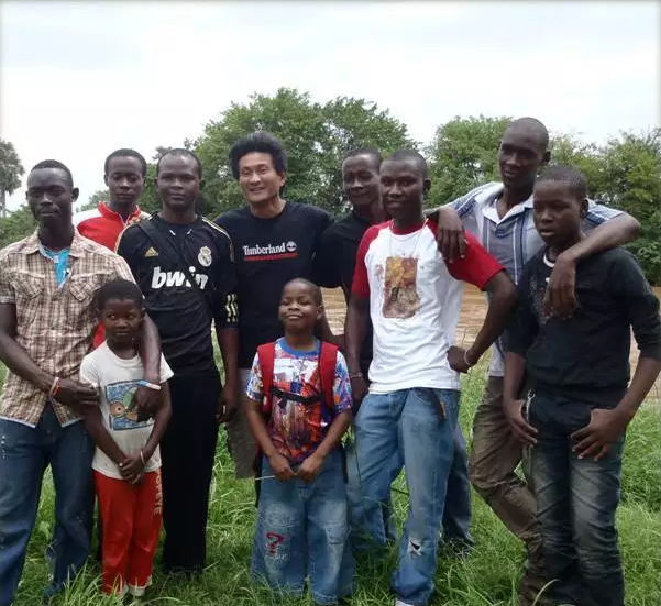Gabriel with youths from the TRLF programmes