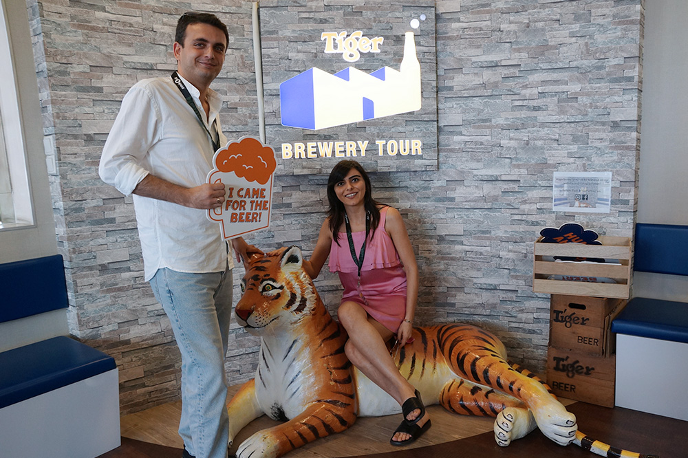 Sunay (right) with fellow MBA participant at the Tiger Beer factory tour