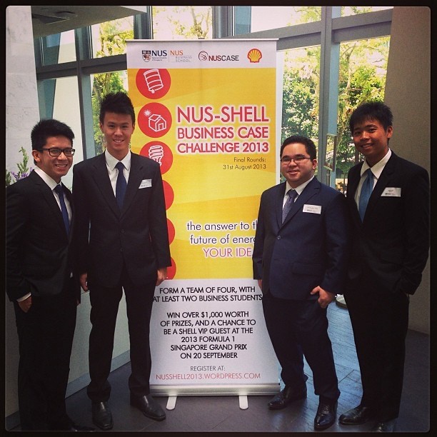 Jason (right) took part in case competitions even as a Year 1 student.