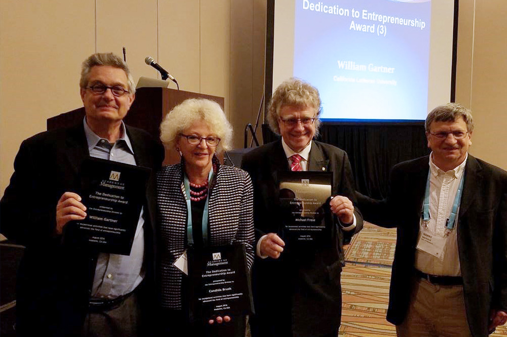 (L-R) Awardees Bill Gartner, Candida Brush, Michael Frese; and Harry Sapienza (Presenter of the award and head of the award committee)