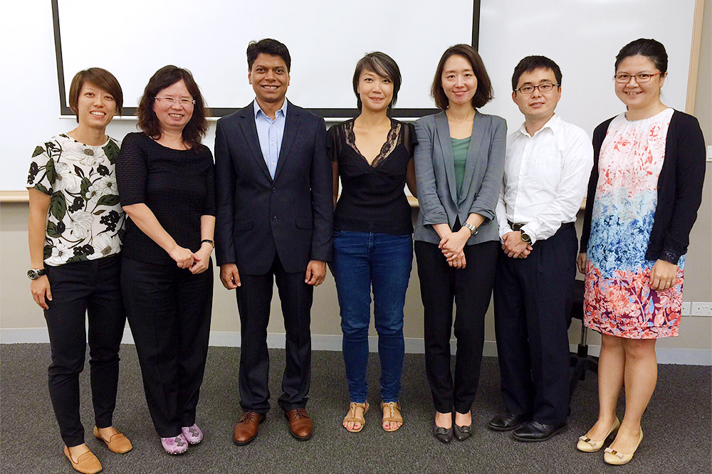Team of MBA students with Carrie Tan (in the middle) founder of DOT and Snr Lecturer Wu Pei Chuan (second from left)