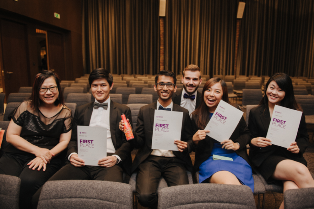 Ahamed Marzouq (third from left) travelled to four cities in three years to participate in international case competitions with the NUS team.