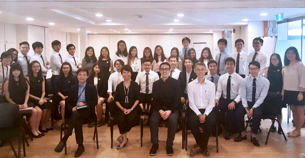 National Gallery Singapore’s CEO Ms Chong Siak Ching (front row, second from left) together with her senior management team (front row) and NUS Business School’s BBA students