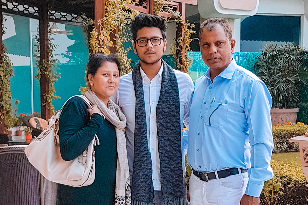 Nayan with his parents