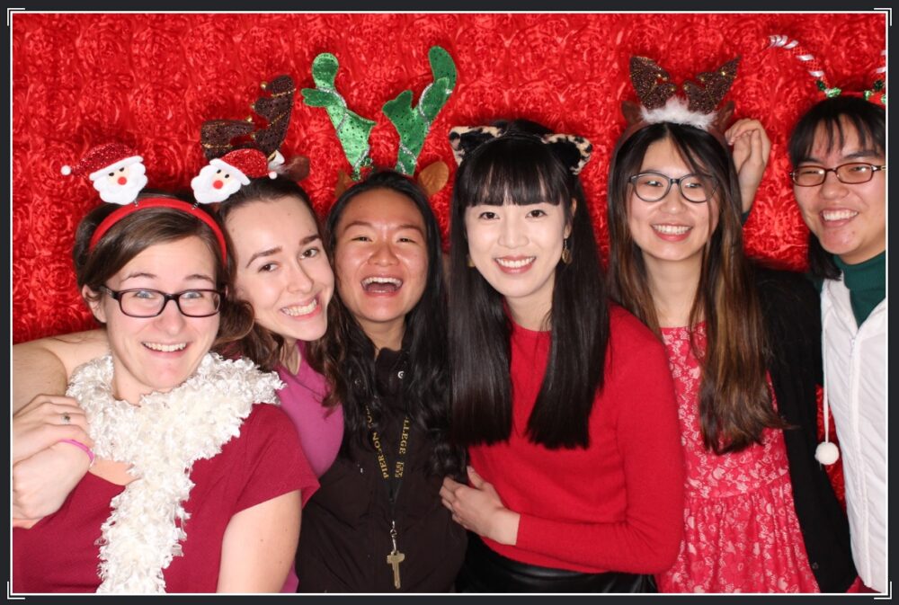 Qiran (third from left) with fellow Yalies at a Christmas party