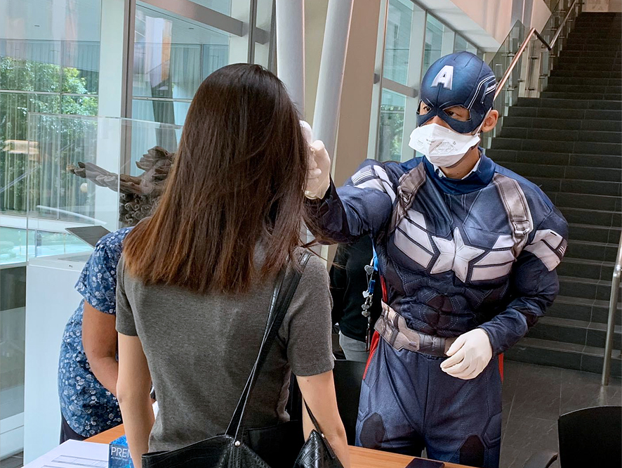“Captain America” on temperature screening duty.
