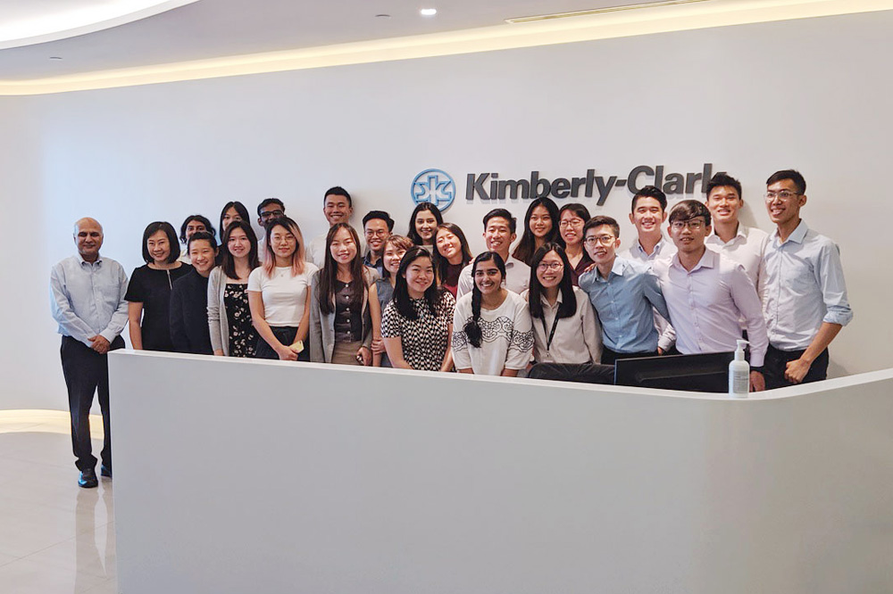 Mr Achal Agarwal (Left) with NUS BBA students at Kimberly Clark, Singapore.