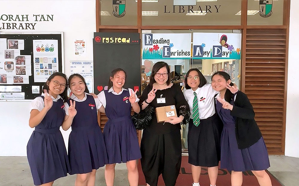 Team Divignite (from left: Jillian Loh, Xie Yuhan, Amanda Chan, Karin Goh, and Jeanette Lee) with Associate Professor Ang Swee Hoon.
