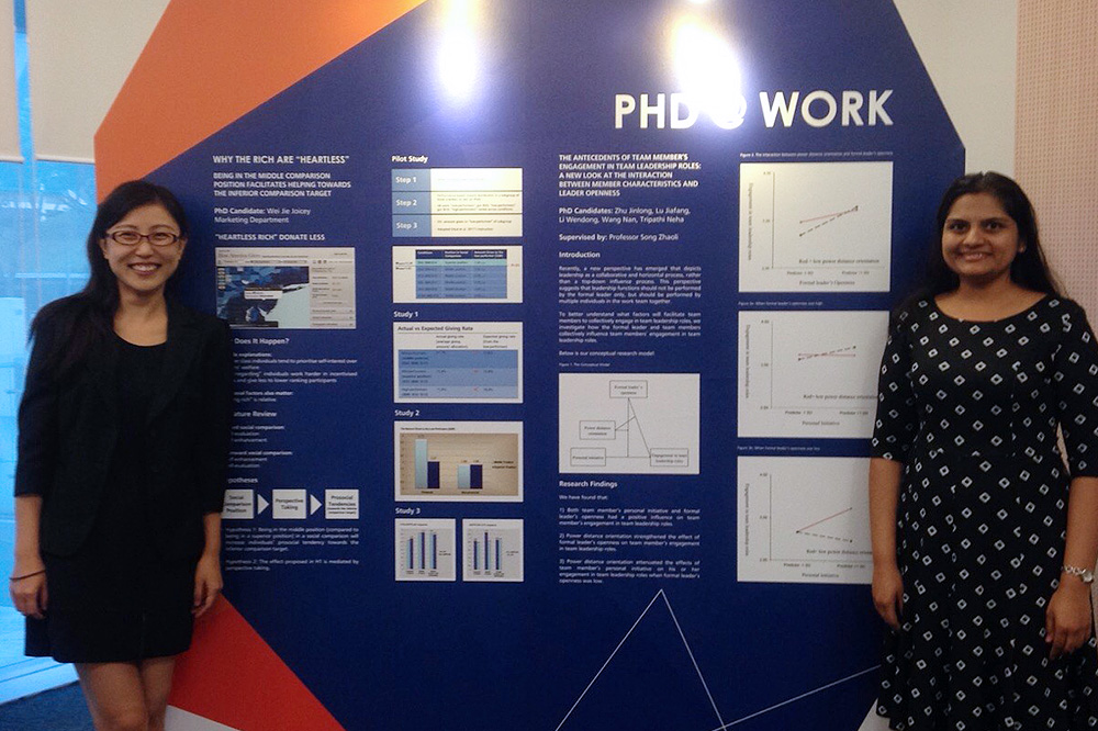 Neha (right) showcasing her work on PhD Research Day 2016