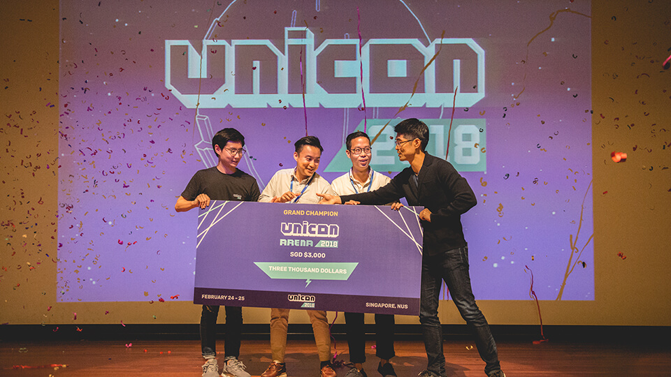 Gush founders Lester Leong and Ryan Lim bagging the top prize at the 2018 Unicon hackathon
