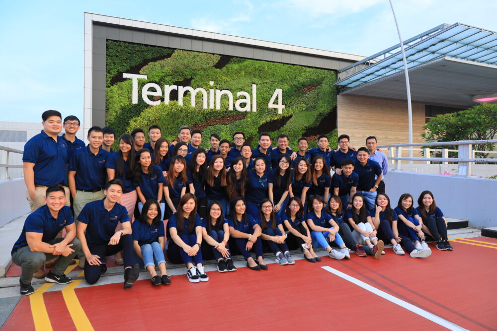 Lucas Lee (last row, ninth from right) with his Terminal 4 team mates