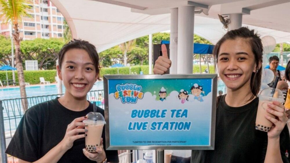 Charis Low (left) and Tan Zhen Ying at their Bubble Tea Live Station at a SAFRA family event.