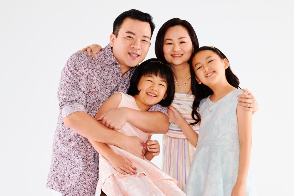 Adrian Chiang with his wife and two daughters.