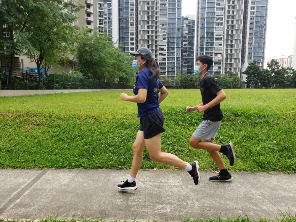 BCR 2021 chairperson Jeannette Chan (left) and her son running in Punggol, Singapore.