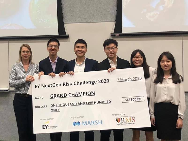 Yan Pheng (second from right) with her team mates, receiving the champion's prize at the 2020 EY NextGen Risk Challenge competition