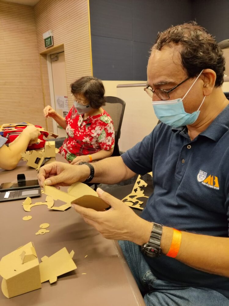 Participants during the cardboard folding class