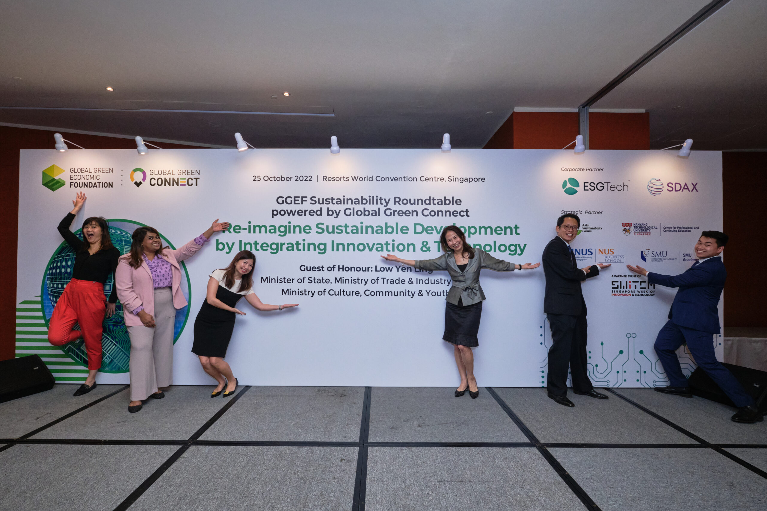 Daren (second from right) posing for goofy photos with his Global Green Connect colleagues after an event