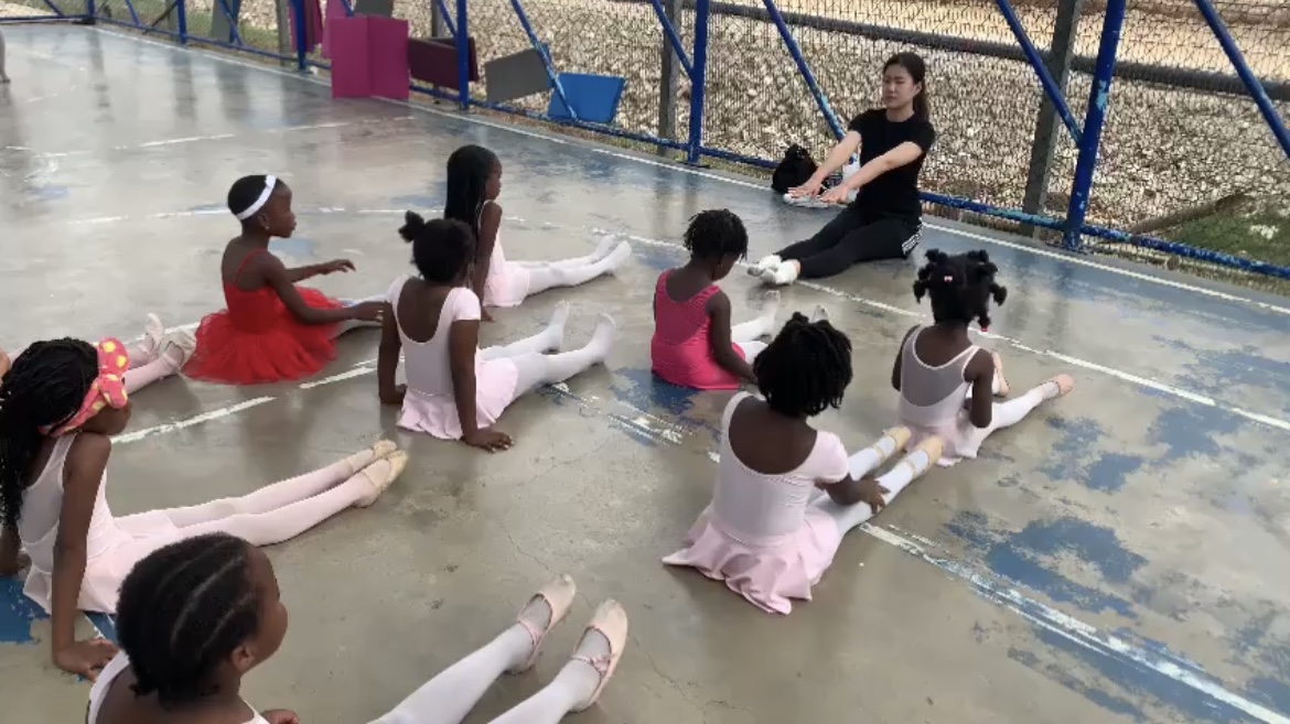In session with her class of ballet students